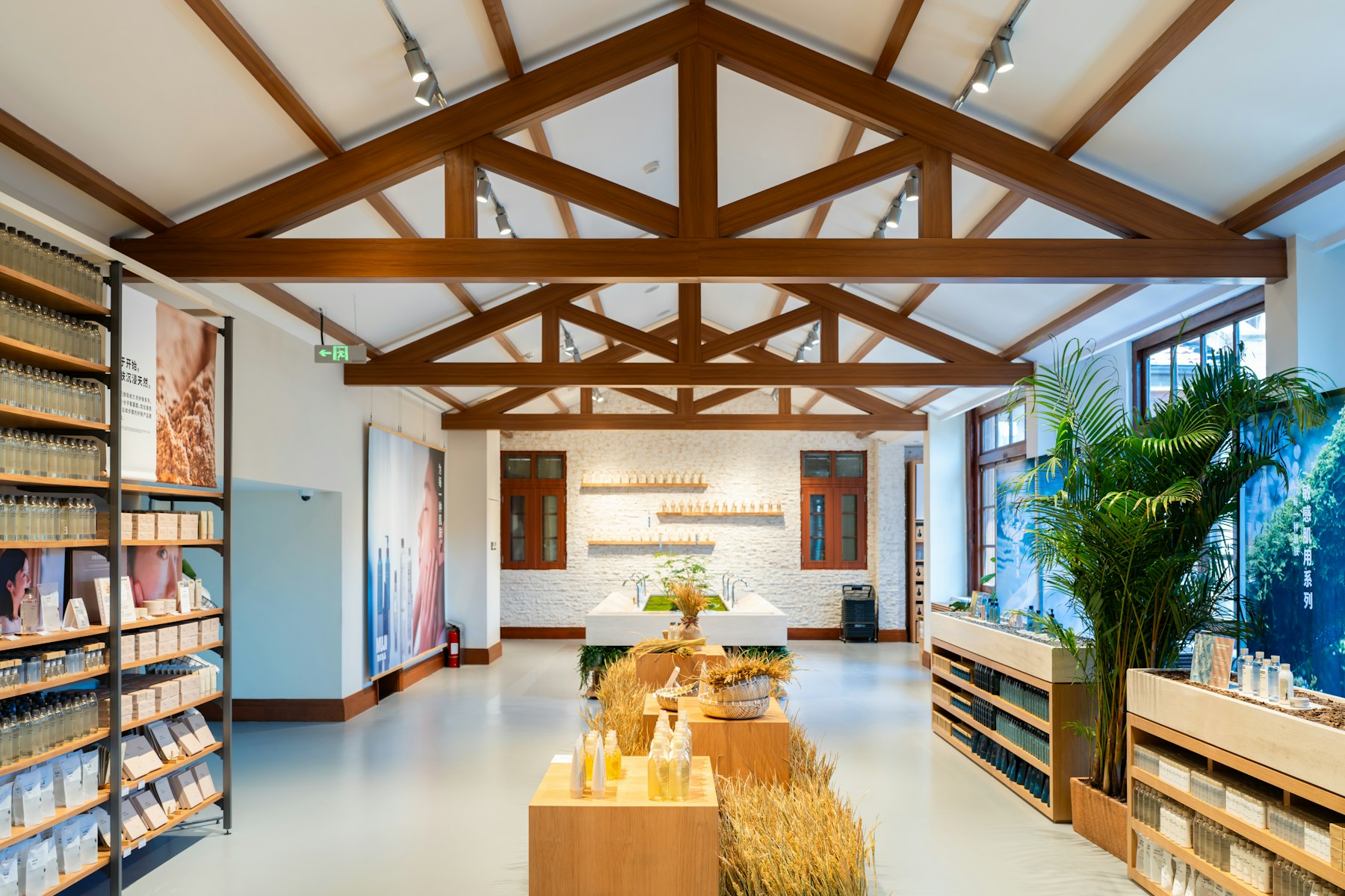 Warm retail interior with wood beams and product displays